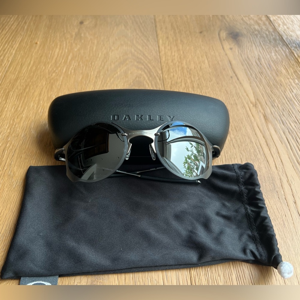 Oakley Tailend Titanium w/ Black Iridium Sunglasses